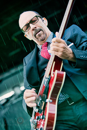 Duke Erikson, playing in the rain