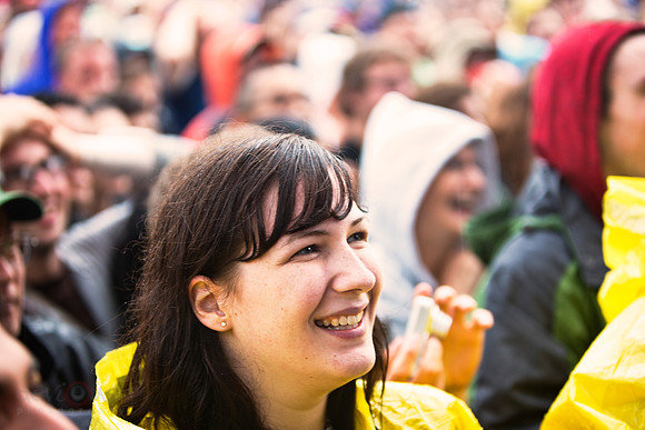 Rain-soaked by happy crowd